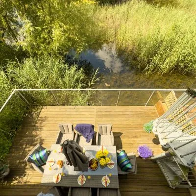 Lakeside decking outside the master bedroom at Velvet Lodge
