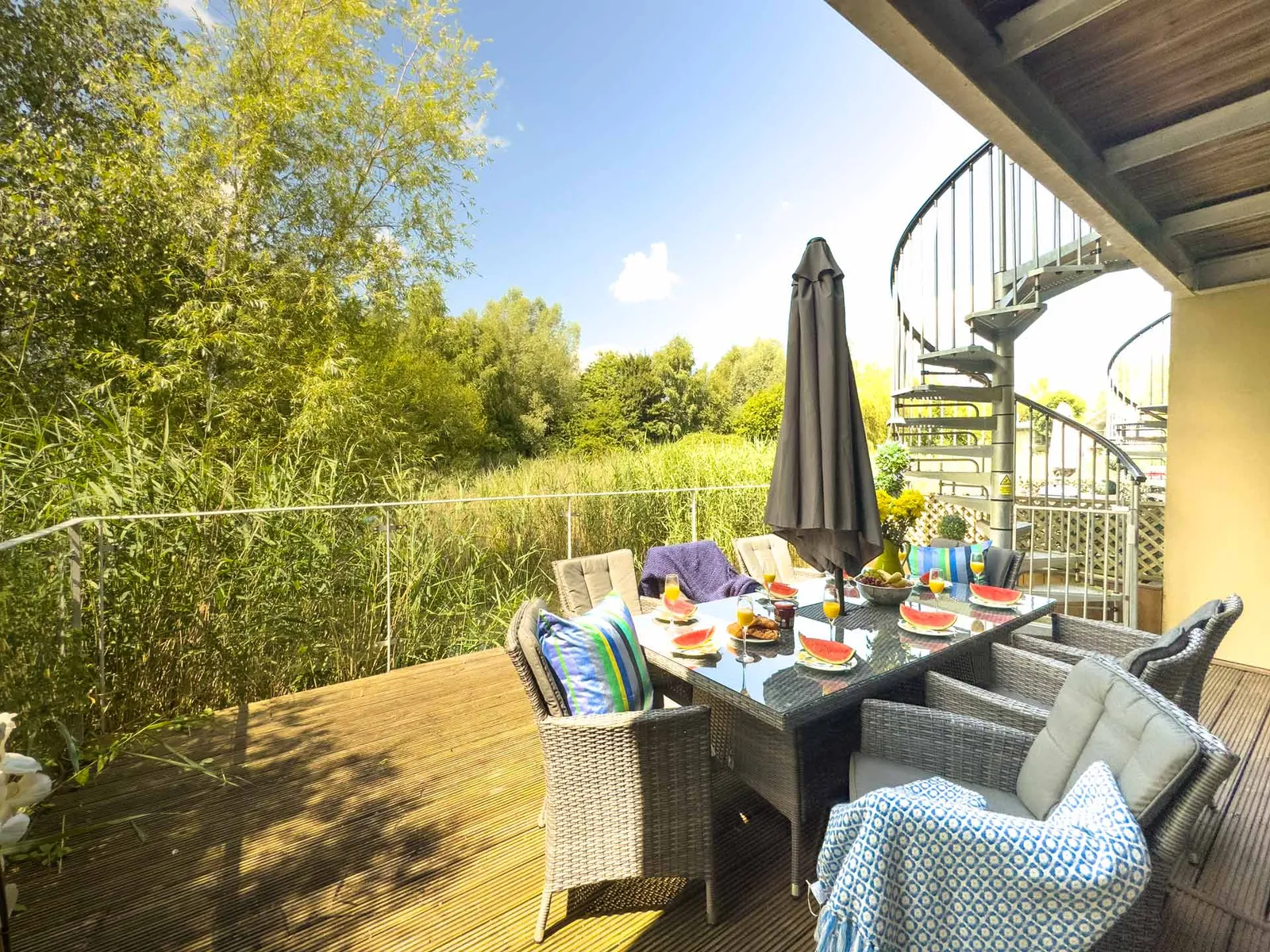 Lakeside decking outside the master bedroom at Velvet Lodge