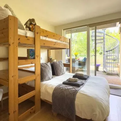Family bedroom at Velvet Lodge with lake views