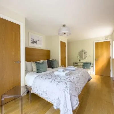 Master bedroom at Velvet Lodge with lake views