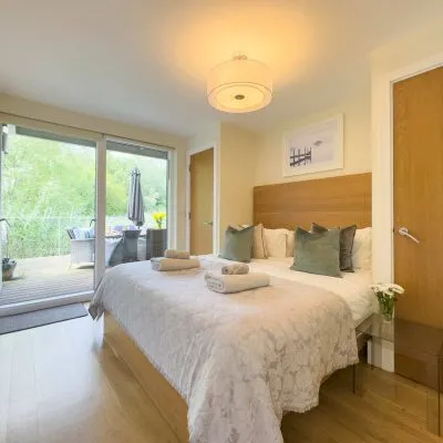 Master bedroom at Velvet Lodge with lake views