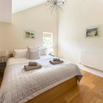 Fourth bedroom at Velvet Lodge with vaulted ceiling