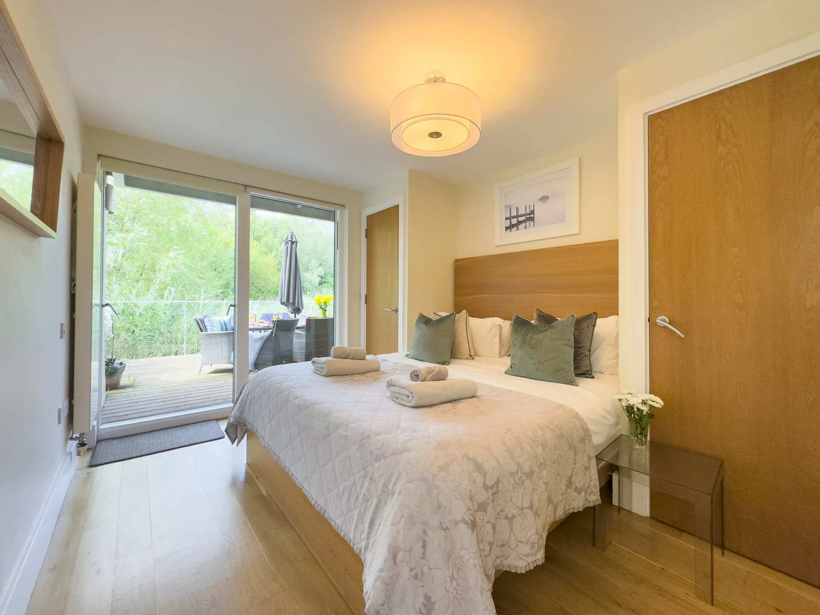 Master bedroom at Velvet Lodge with lake views